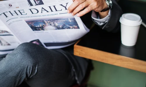 businessman-reading-daily-news